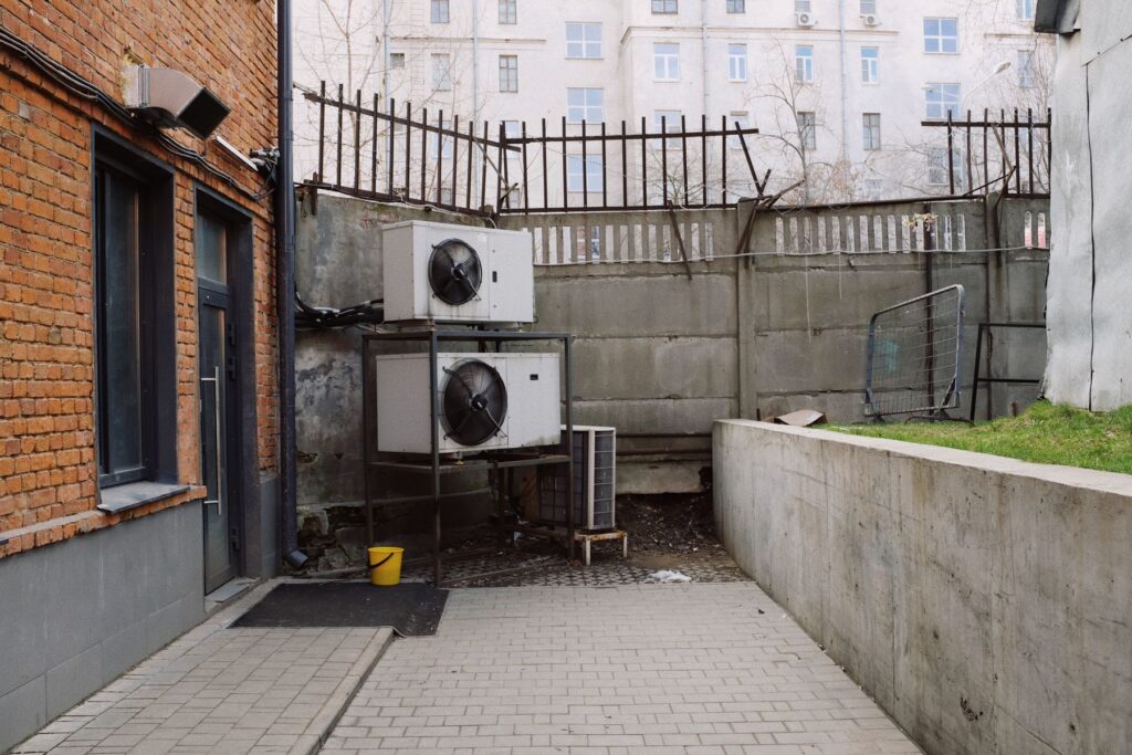 Outdoor air conditioning units beside a building
