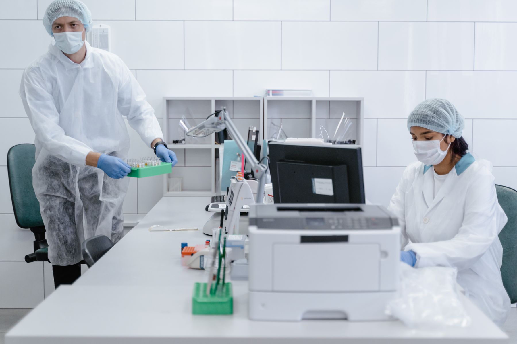 Environmental testing team processing samples in a laboratory