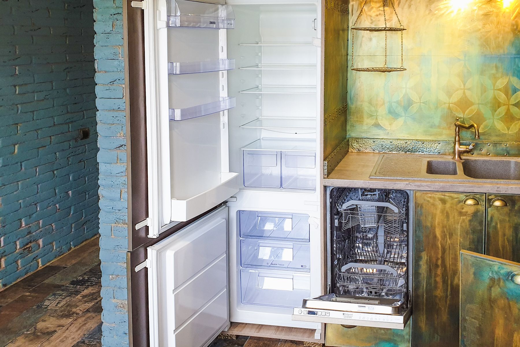 Open refrigerator and dishwasher in a modern kitchen
